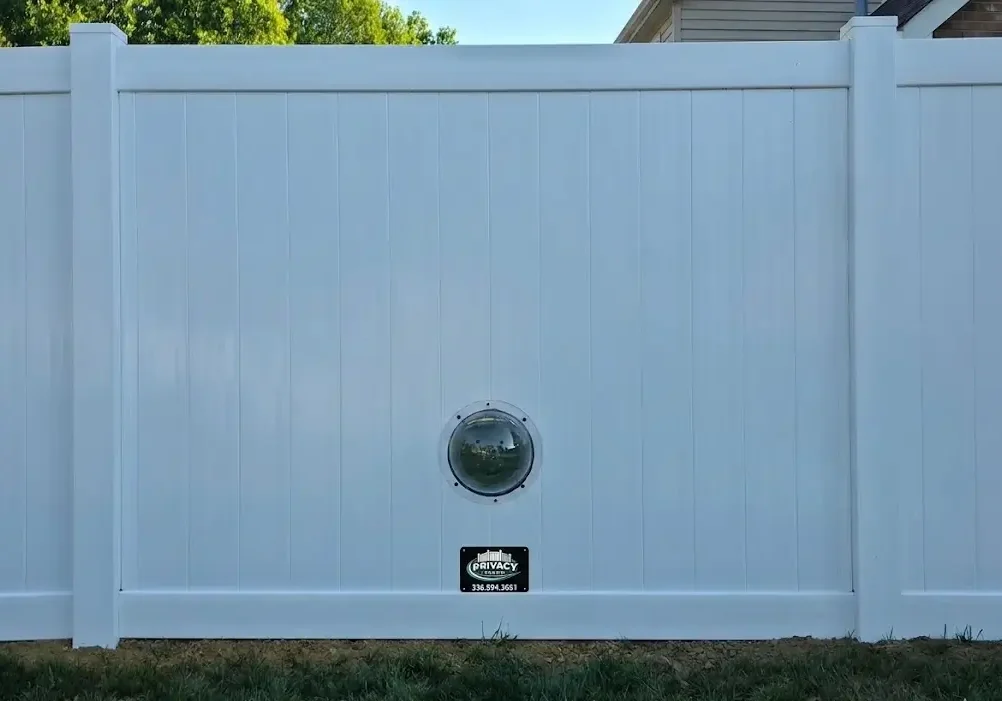 pet window on white fence
